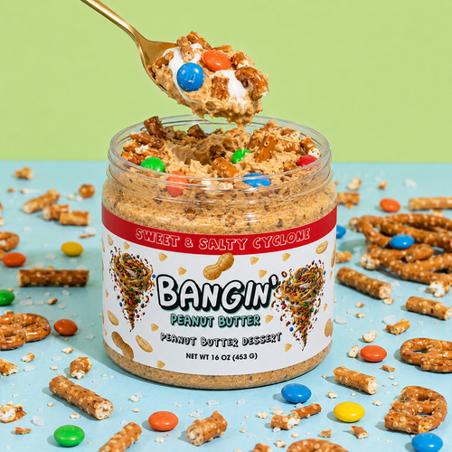 Scoop of Sweet & Salty Cyclone dessert peanut butter with crunchy pretzels, chocolate candy pieces and marshmallow creme.