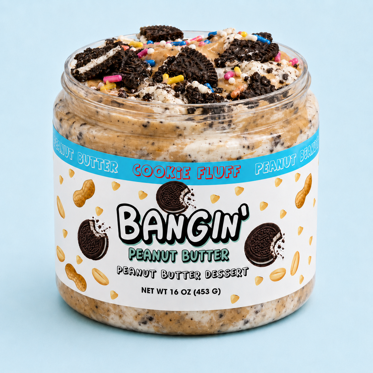 Cookie Fluff dessert peanut butter loaded with chocolate sandwich cookie pieces, marshmallow creme, white chocolate drizzle and rainbow sprinkles.