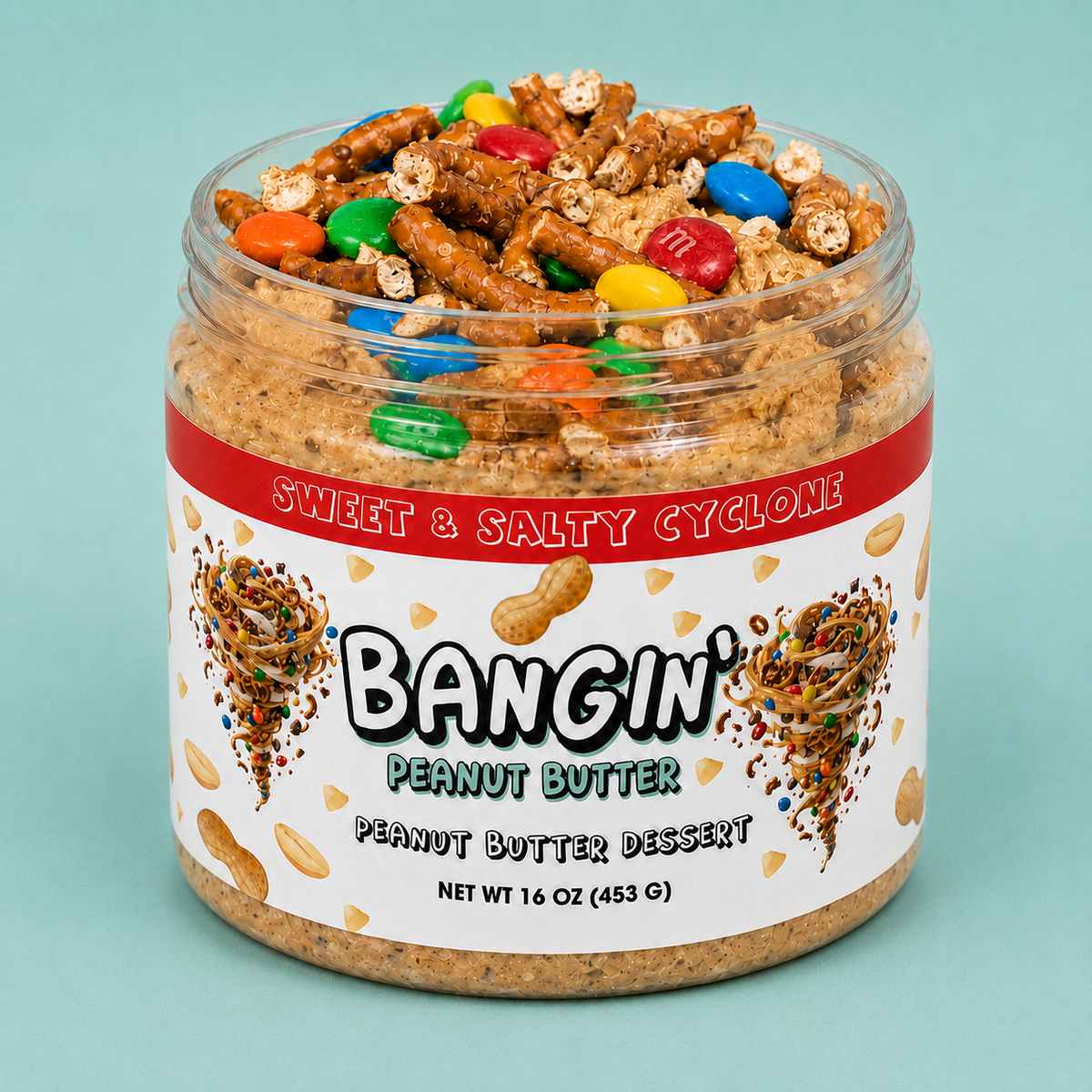 Salty & Sweet Cyclone white chocolate Peanut Butter Base, mixed with mashmallow creme, loaded with with pretzels, and chocolate M&M's