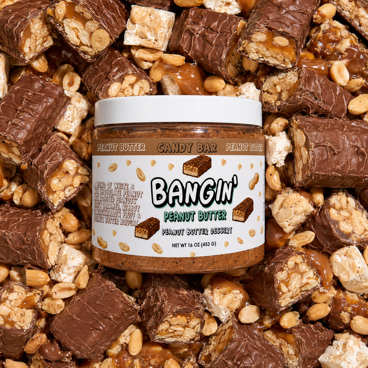 Candy Bar dessert peanut butter jar surrounded by chocolate, roasted peanuts and caramel-inspired mix-ins.